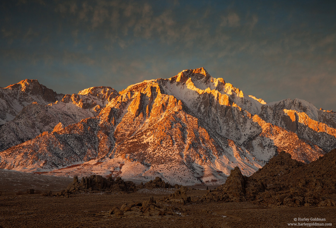 The sunrise highlights Lone Pine peak.