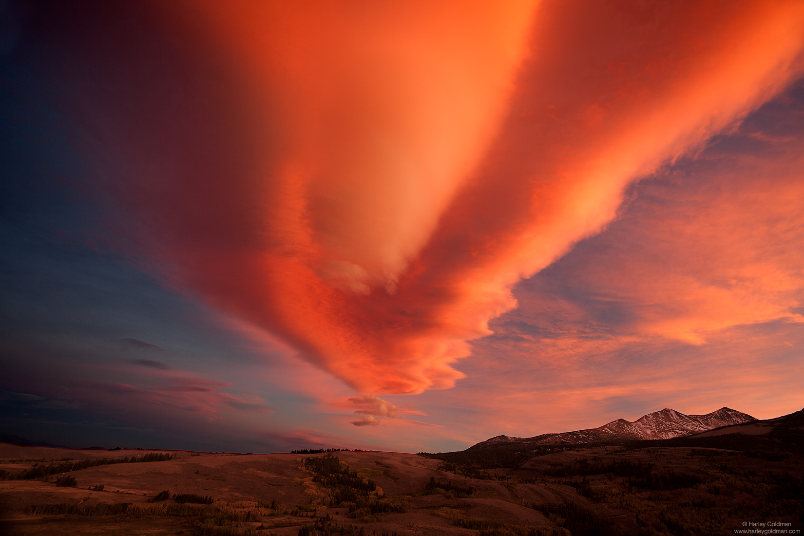 This type of cloud formation is known as the Sierra Wave, a lenticular cloud caused by winds off the mountains.